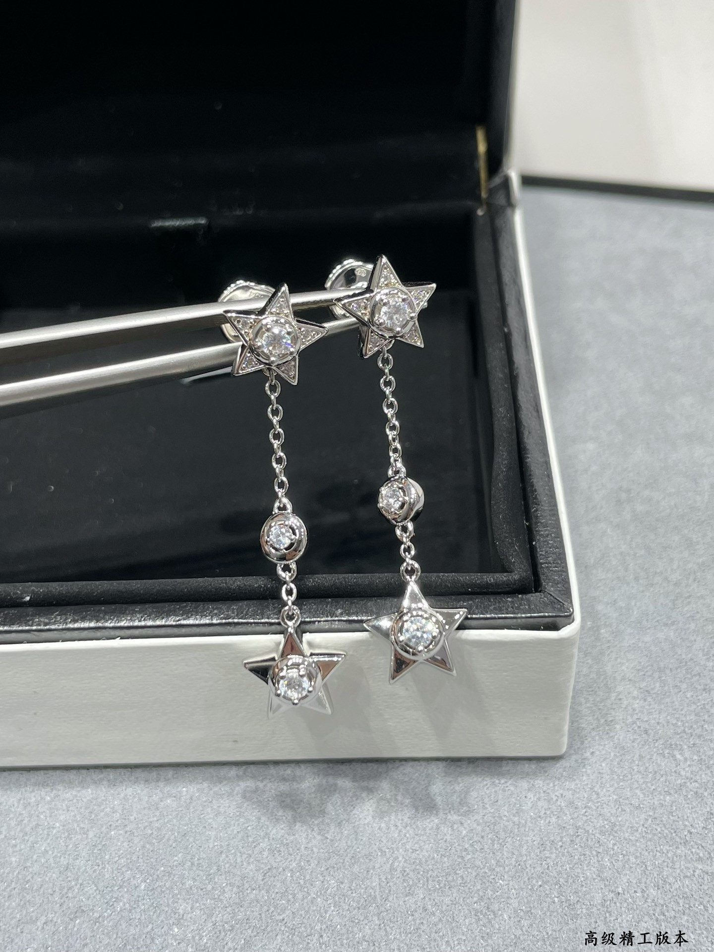 Ch*el hanging chain star earrings