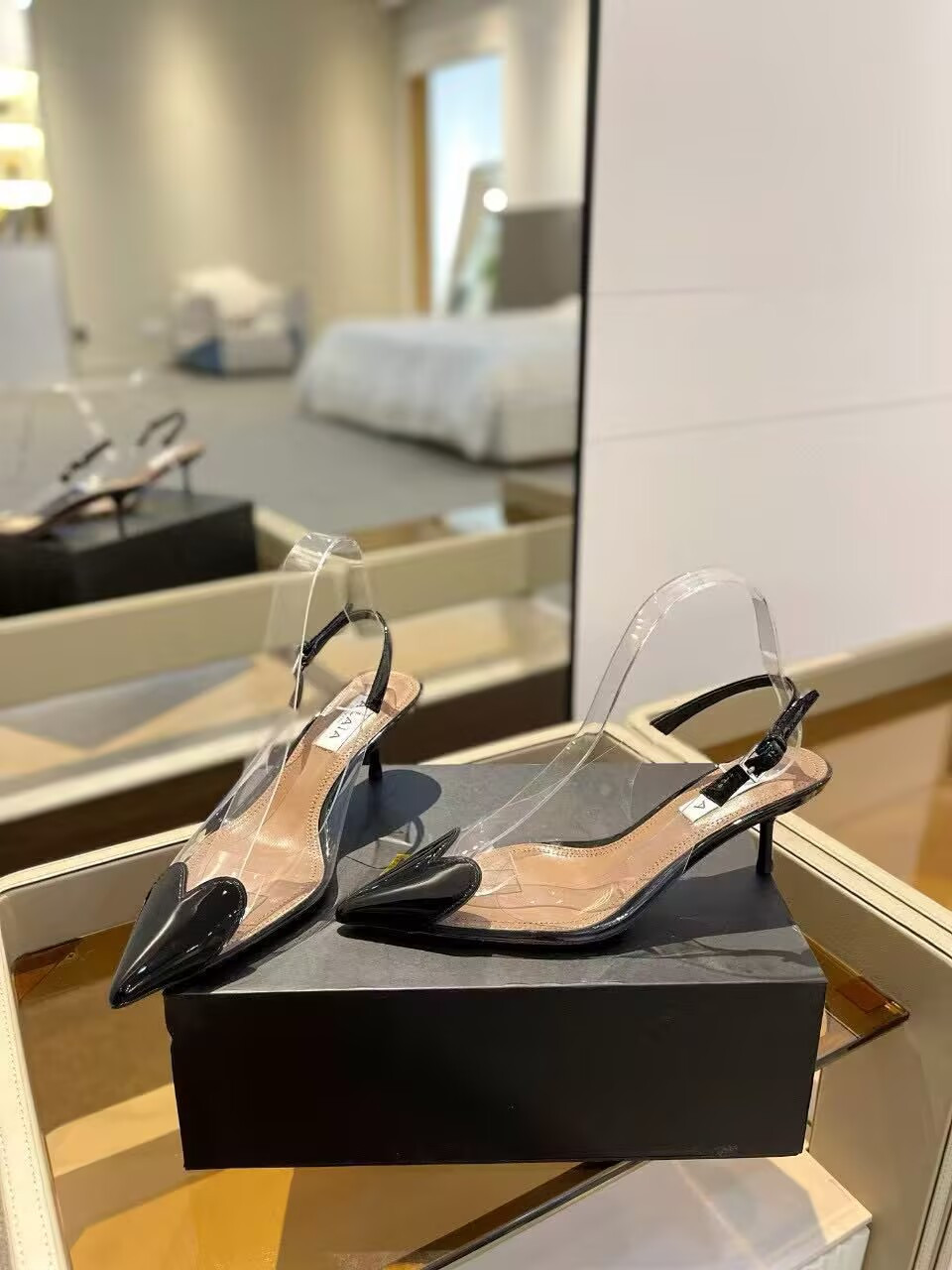 UA ALAÏA Le Coeur Plexi Heart-Toe Slingback Pump